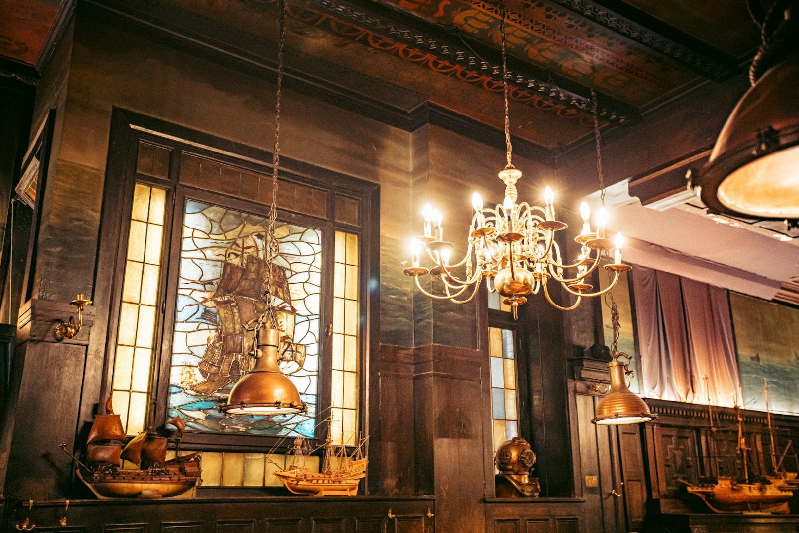 old wooden interior and stained glass at the Shifferbörse in Hamburg