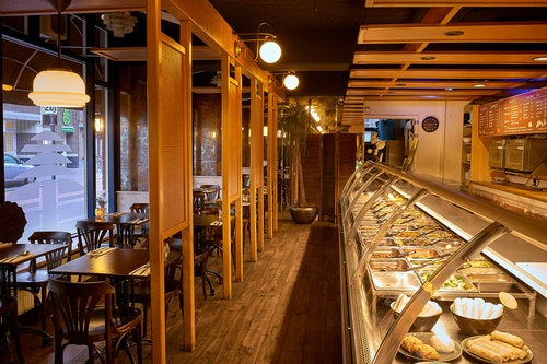 restaurant interior and food counter at Toko Frederik