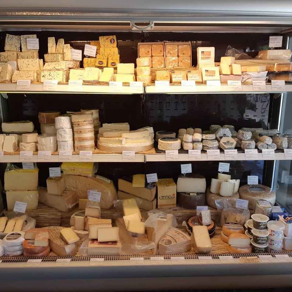 Fridge with different kinds of cheese at Proefhuys store in The Hague