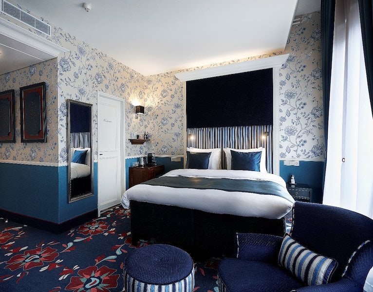 blue white room interior at the Carlton Ambassador hotel in The Hague