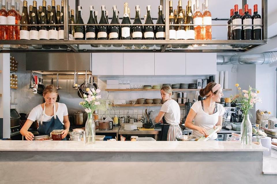 staff cooking at 26 Grains restaurant