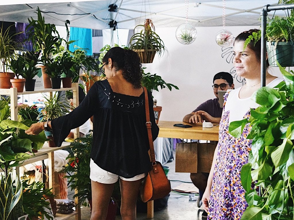 woman shopping plants at the Thrifter Market Miami