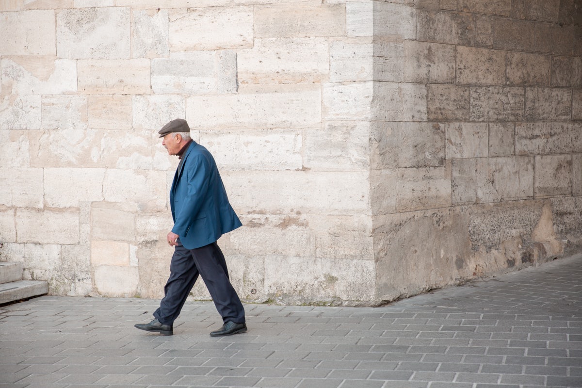 Istanbul - man walking down the street in Eminönü neighbourhood