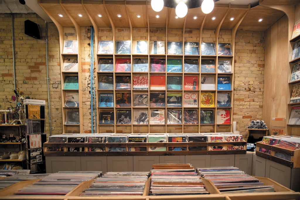 vinyls at the wall at the Tiny Record Store in Toronto