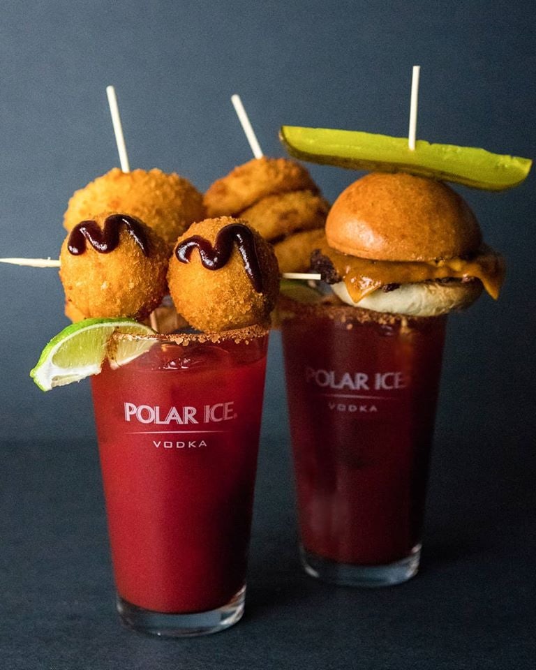 two caesars from Score on Davie with snacks on top