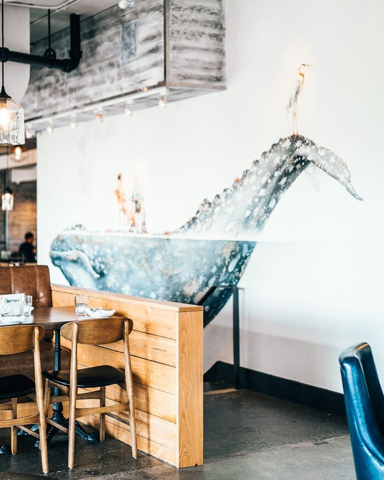 wall art of a whale at Hook Seabar restaurant in Vancouver