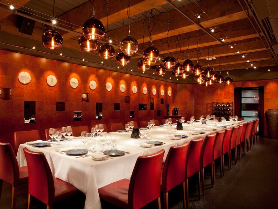 red dining room for large groups at the Blue Water Cafe in Vancouver