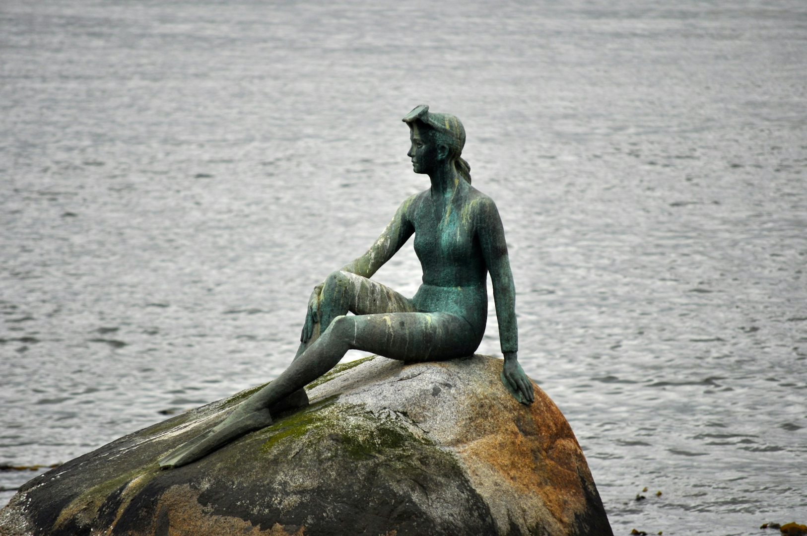 statue by the Vancouver seawall 'Girl in a Wetsuit'