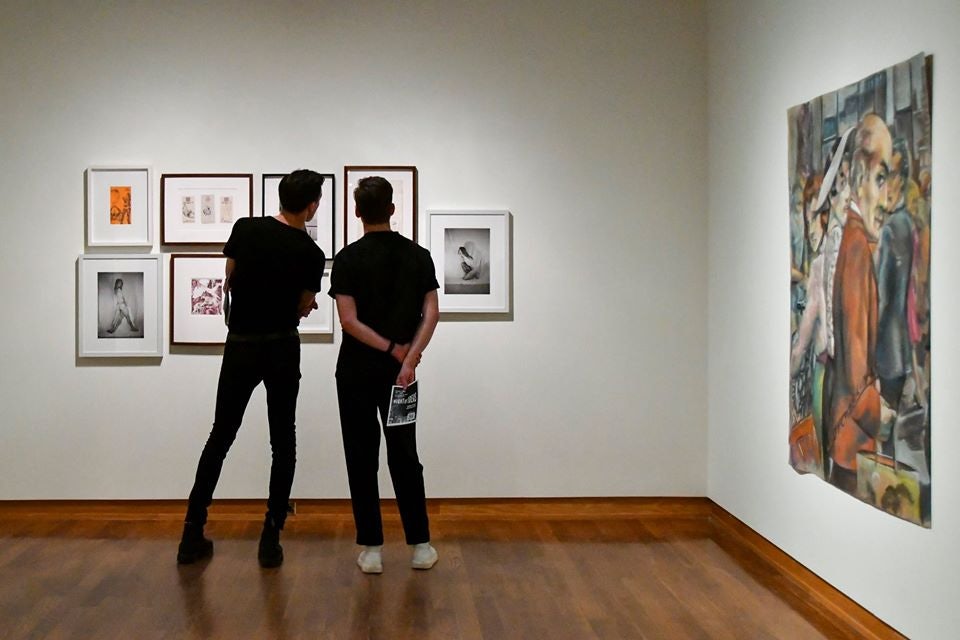 two men watching art at the Art Museum of Toronto