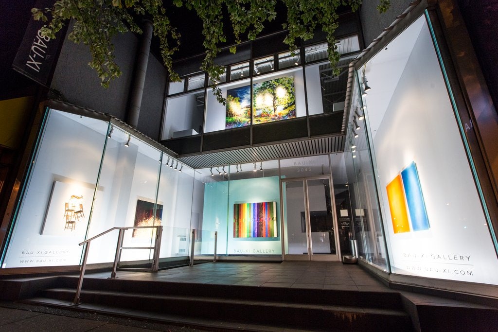 entrance of the Bau-Xi gallery by night