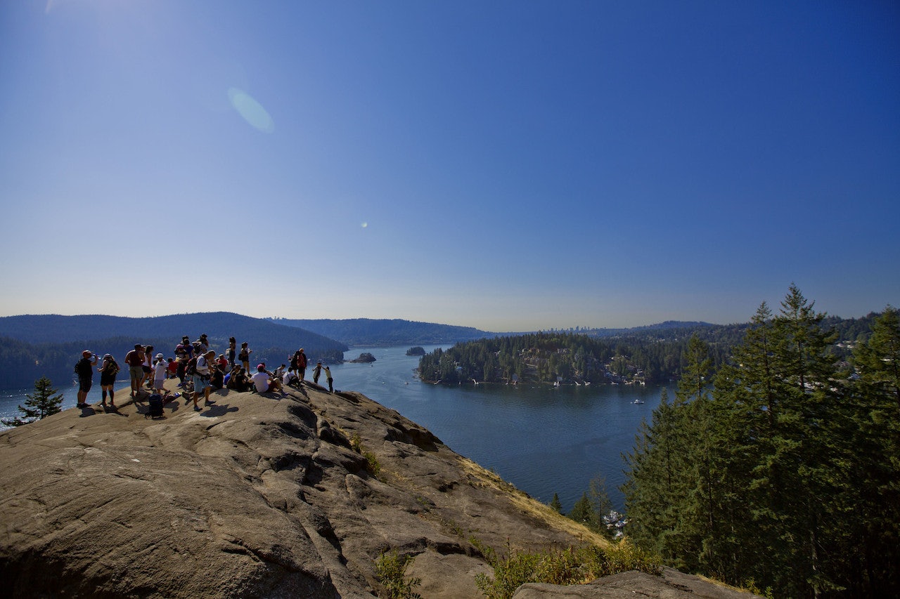 a group of hikers on top of Quarry Rock