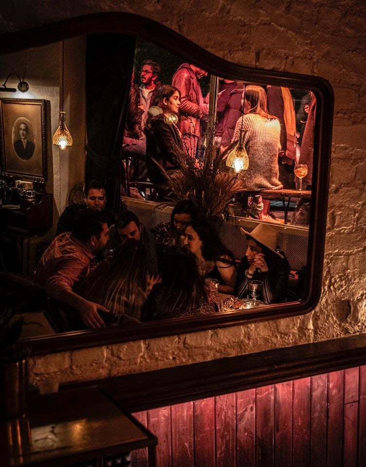 people enjoying cocktails at Markus Tavern