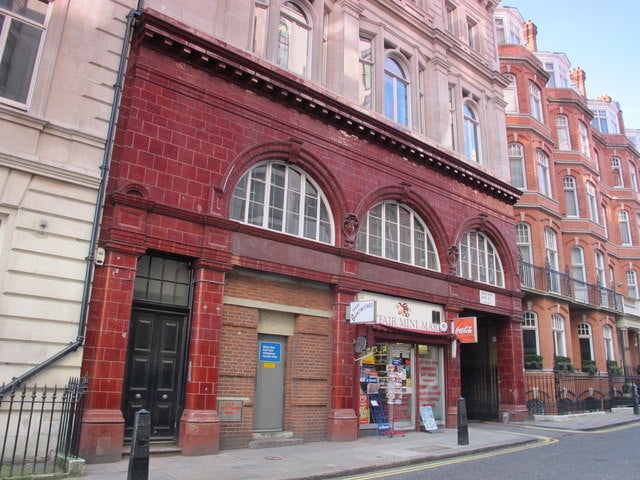 red coloured entrance to Down Street Station
