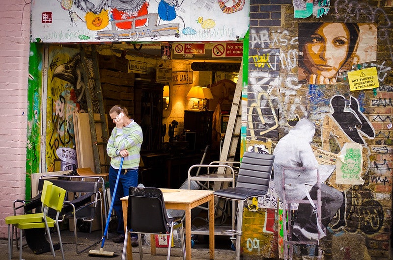 vintage chairs in front of a store at Brick Lane Market