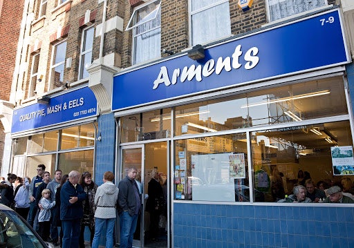 people queueing at Arments Pie and Mash shop