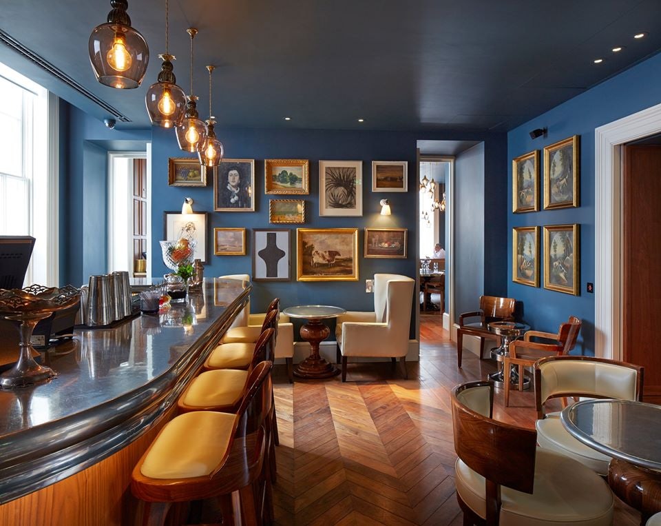 blue and vintage interior of lounge at the Great Northern Hotel