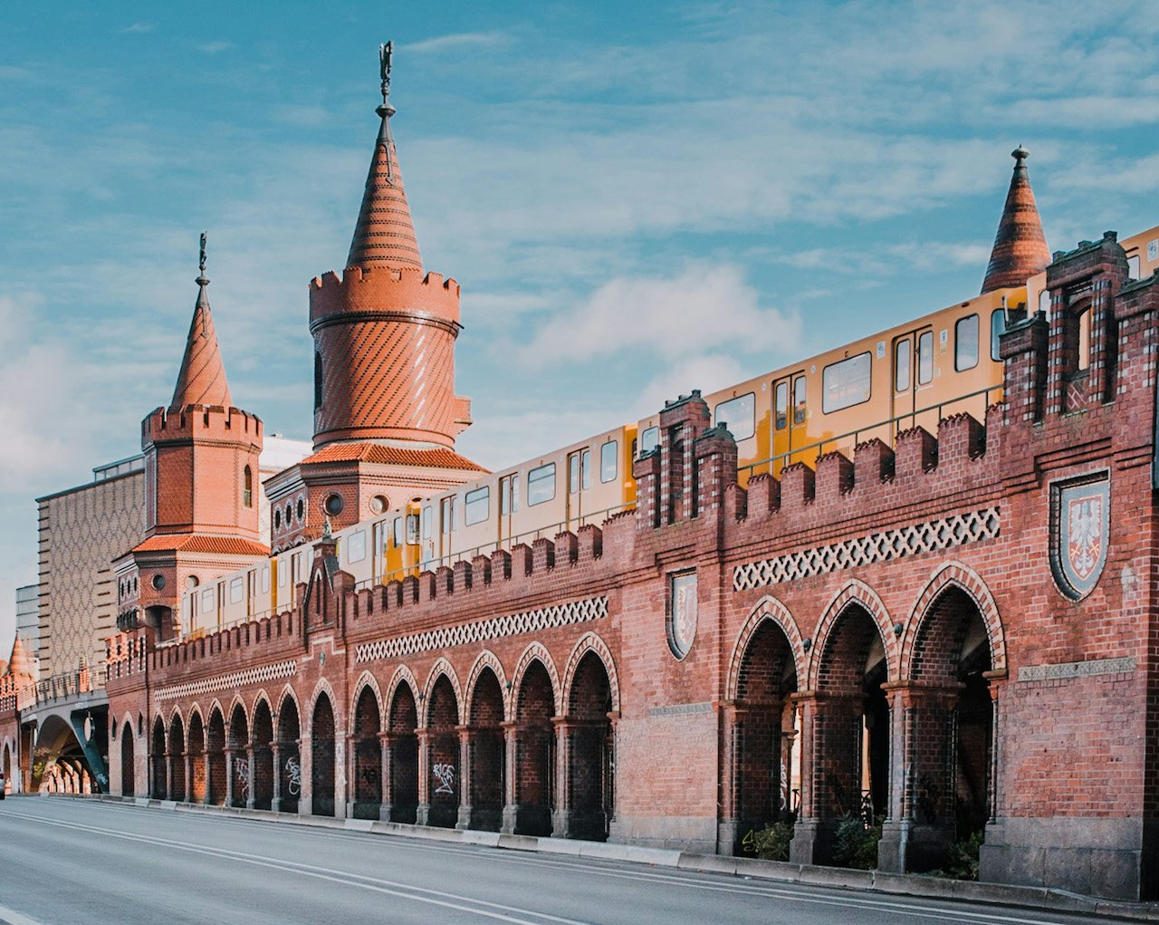 the Oberbaum Bridge in Friedrichshain against a blue sky