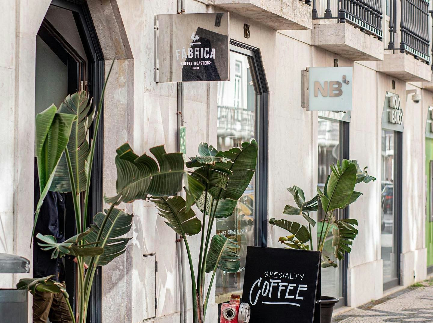 entrance and street view of Fabrica Coffee Roasters in Porto