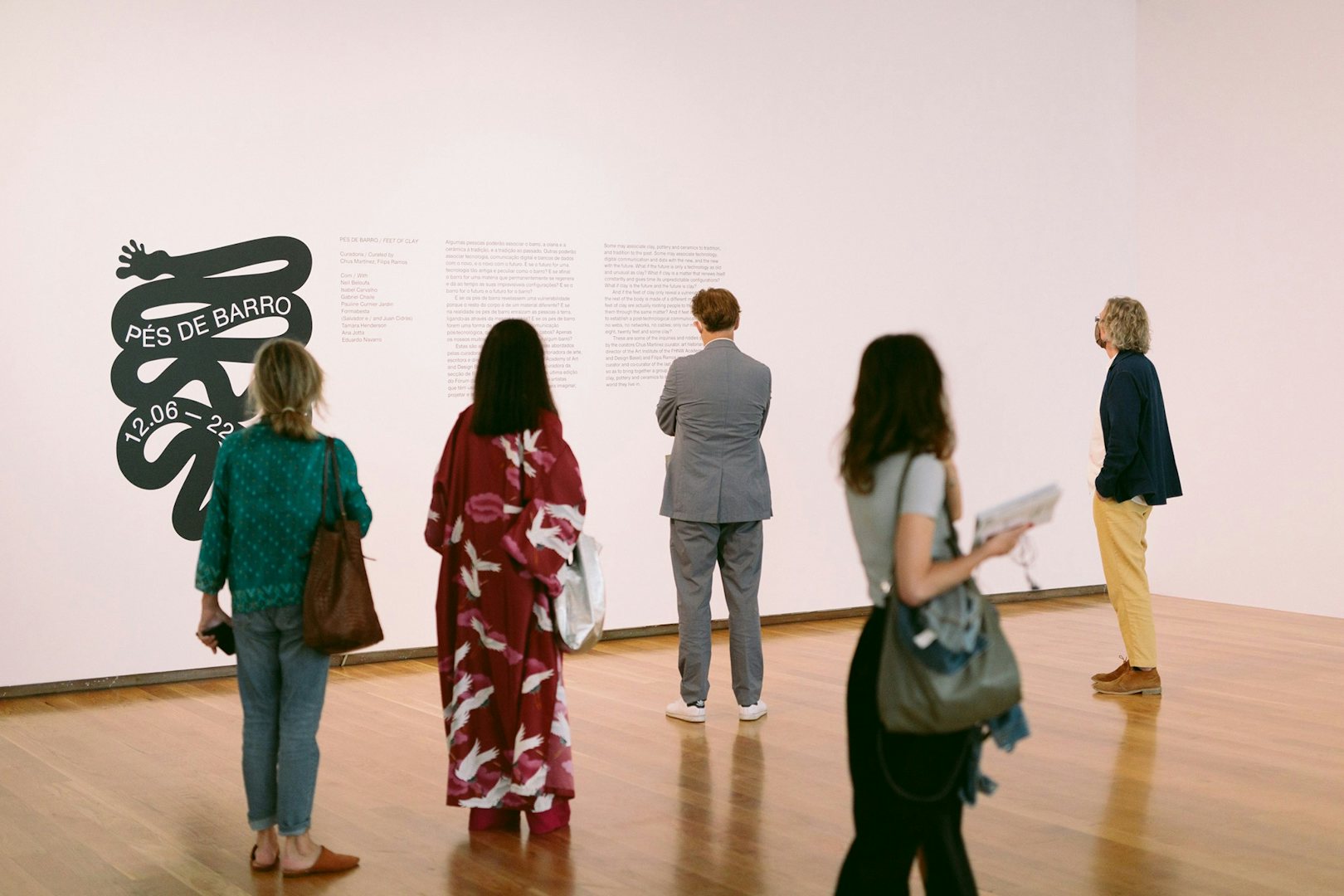 people admiring artwork at the Galeria Municipal do Porto 