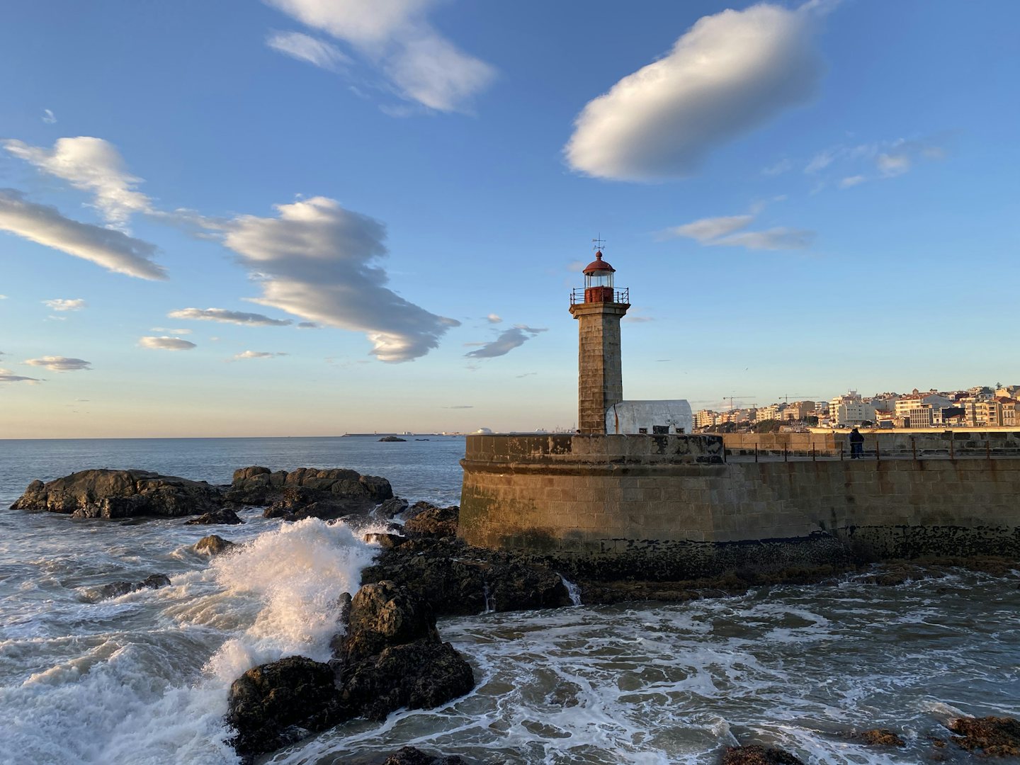 waves breaking at the Felgueiras Lighthouse in Porto
