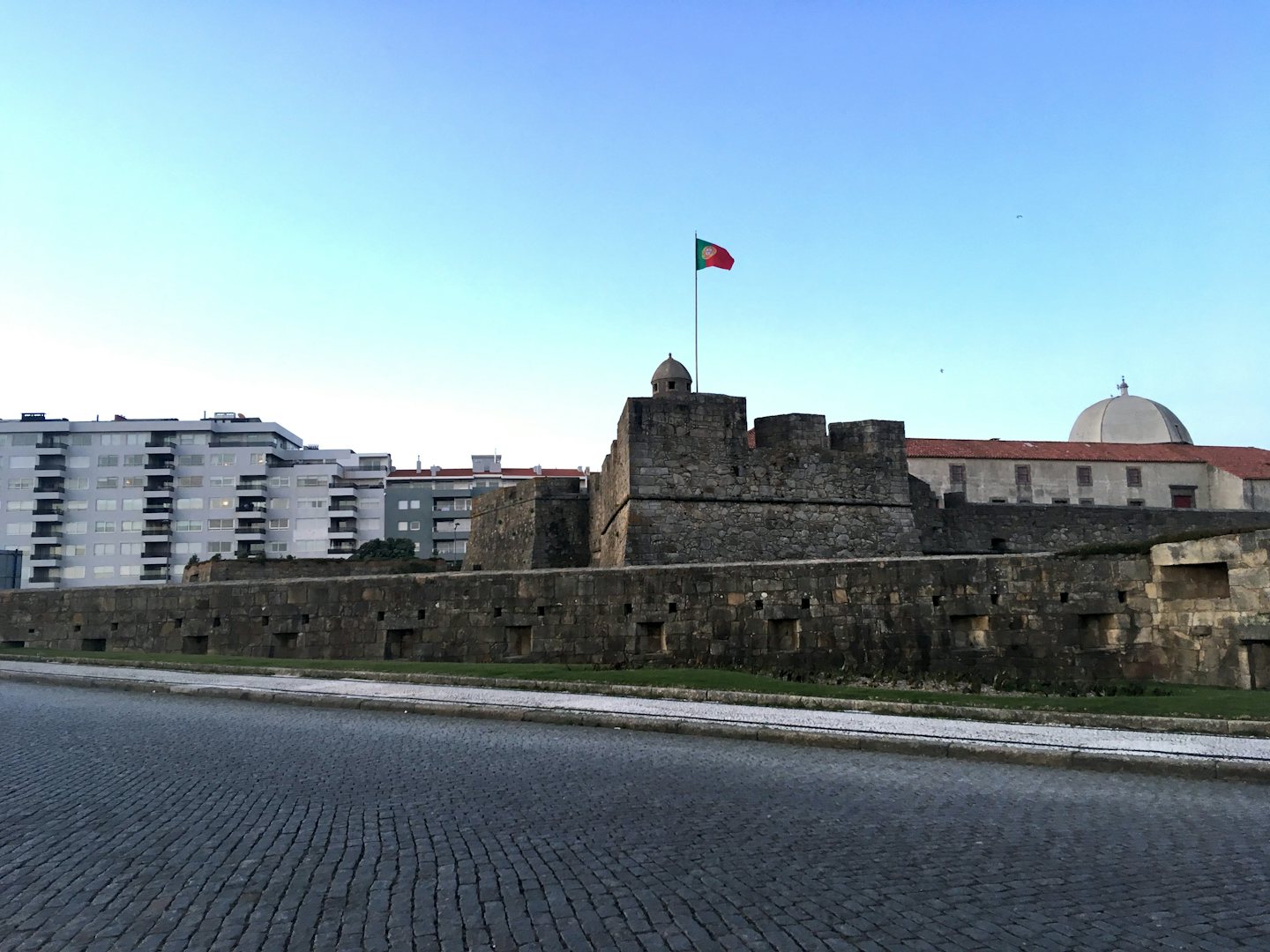 exterior of the Forte de São João Baptista against a blue sky 