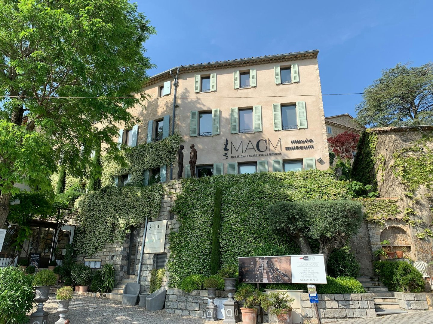 exterior of the Musée d'Art Classique de Mougins against a bright blue sky