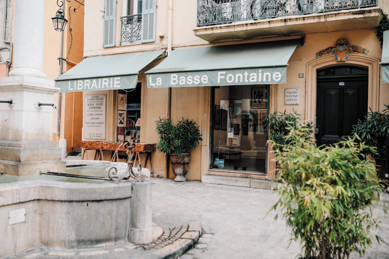 the pastel-orange front of La Basse Fontaine bookshop
