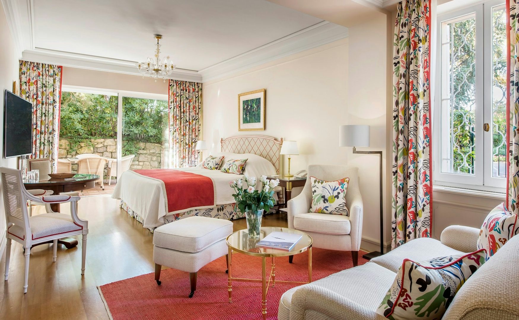 a bedroom suite at Hotel du Cap-Eden-Roc