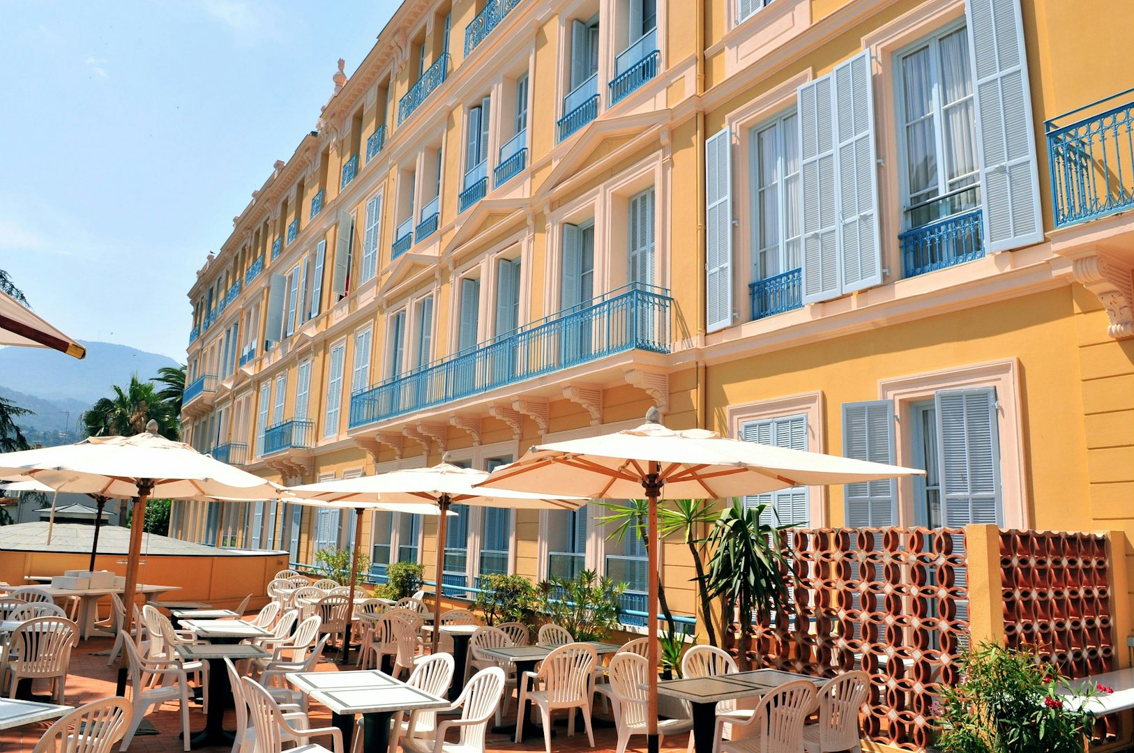 sunny terrace at hotel L’Orangeraie