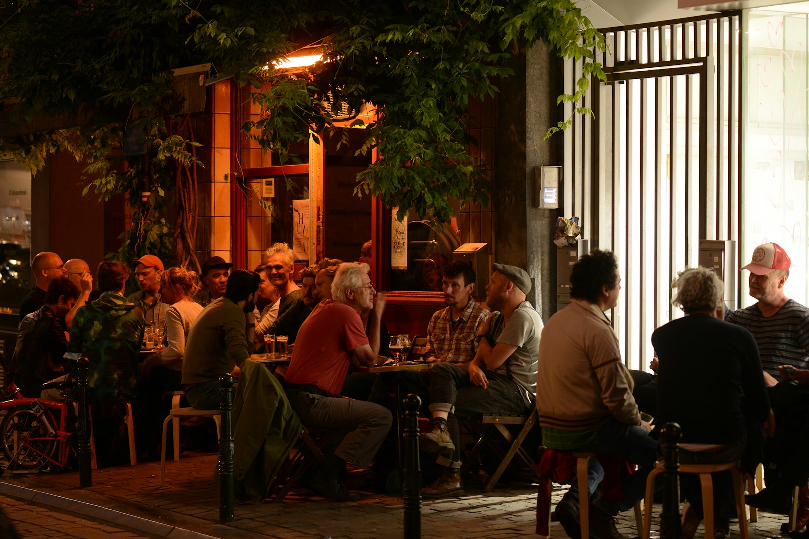 people on the terrace of Au Daringman during the evening