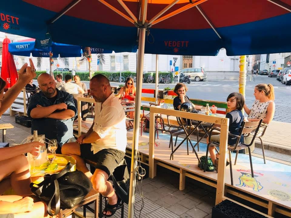 people enjoying drinks on the terrace of Charlatan Gent