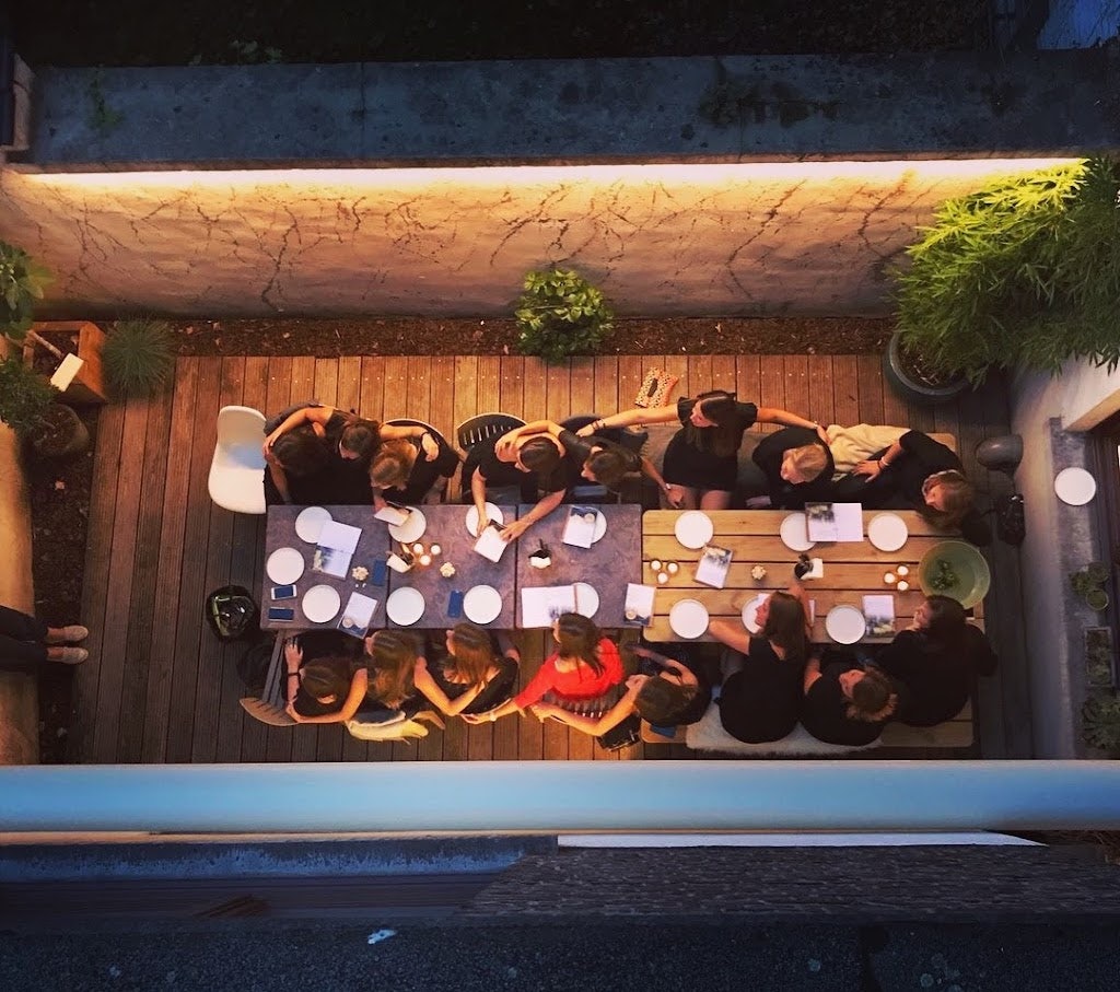 people seated at at dinner table at Boulebaar