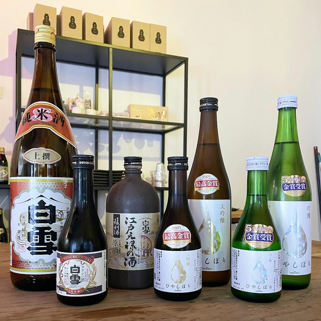 A collection of sake bottles at SakeMico in Lisbon