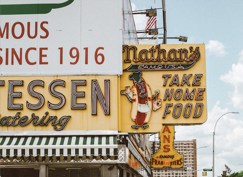 corner building with Nathan's Famous restaurant in it on Coney Island 