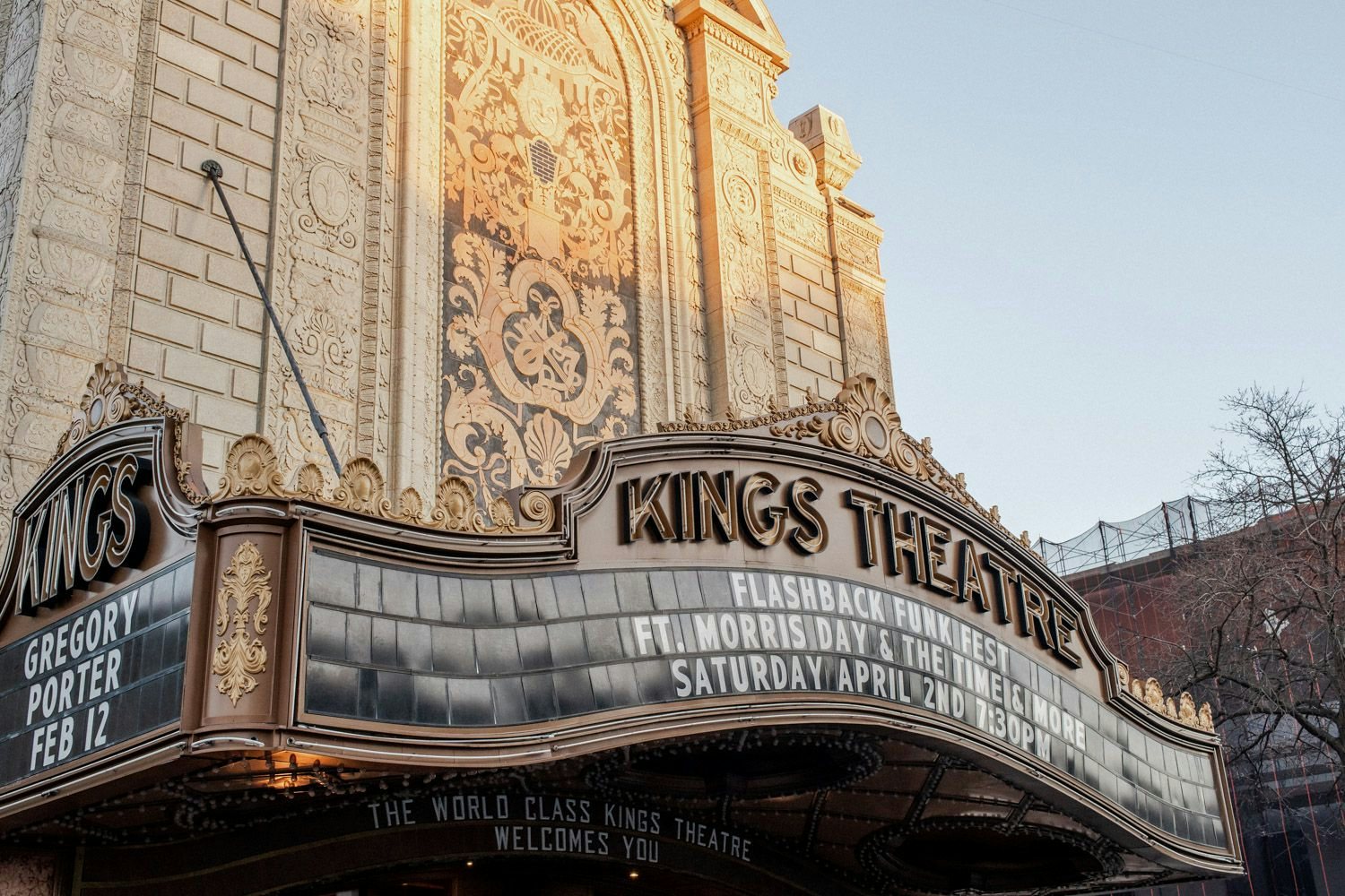 retro exterior and signage of the Kings Theatre in Brooklyn