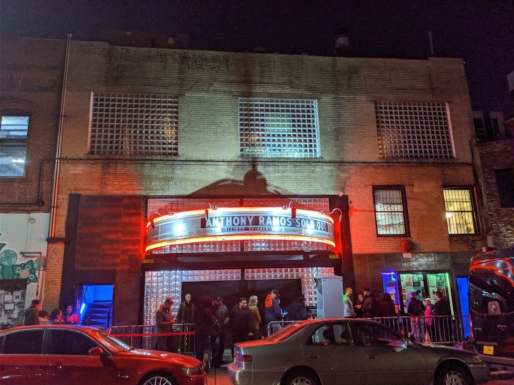 neon signs and people queueing at the Music Hall of Williamsburg