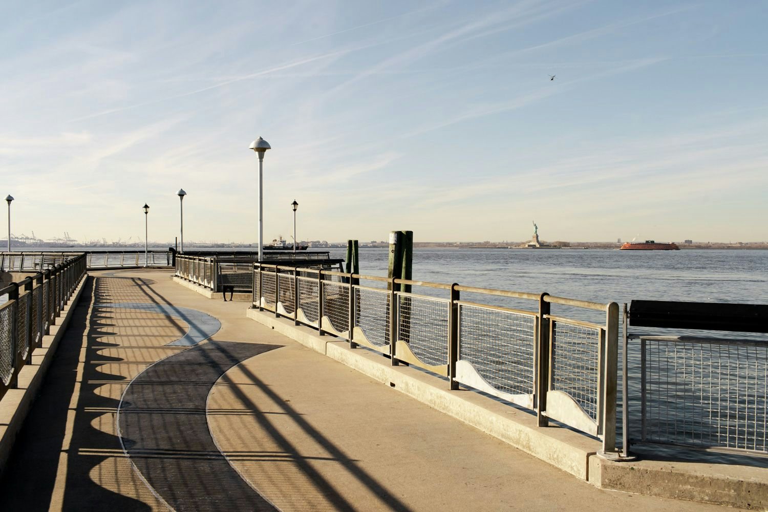 view over the water and statue of liberty from Louis Valentino Jr. Park and Pier
