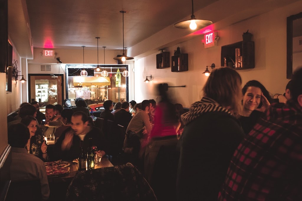 people enjoying dinner at Emily restaurant in Brooklyn 