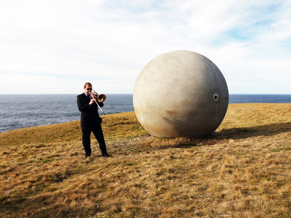 a big sculpture in the shape of a ball called Orbis et Globus