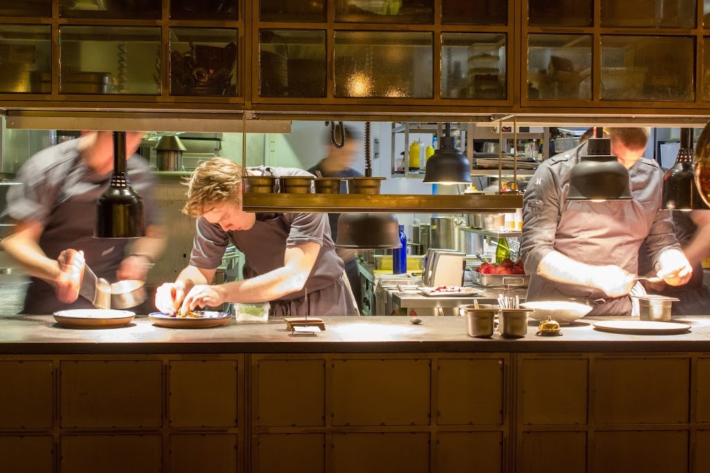 chef cooking at Kol Restaurant Reykjavik 