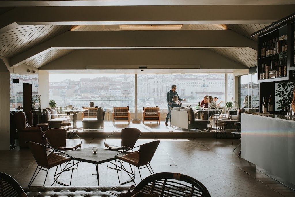 sleek interior of Terraço Editorial rooftop bar in Lisbon