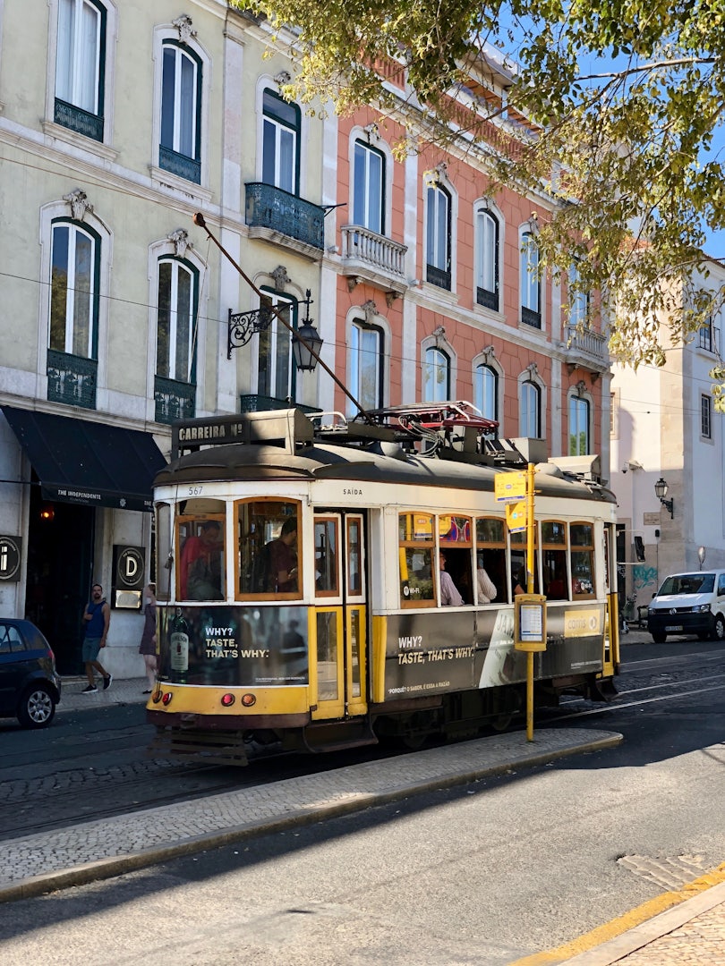 A trolley on tram line 24 at a stop in Lisbon