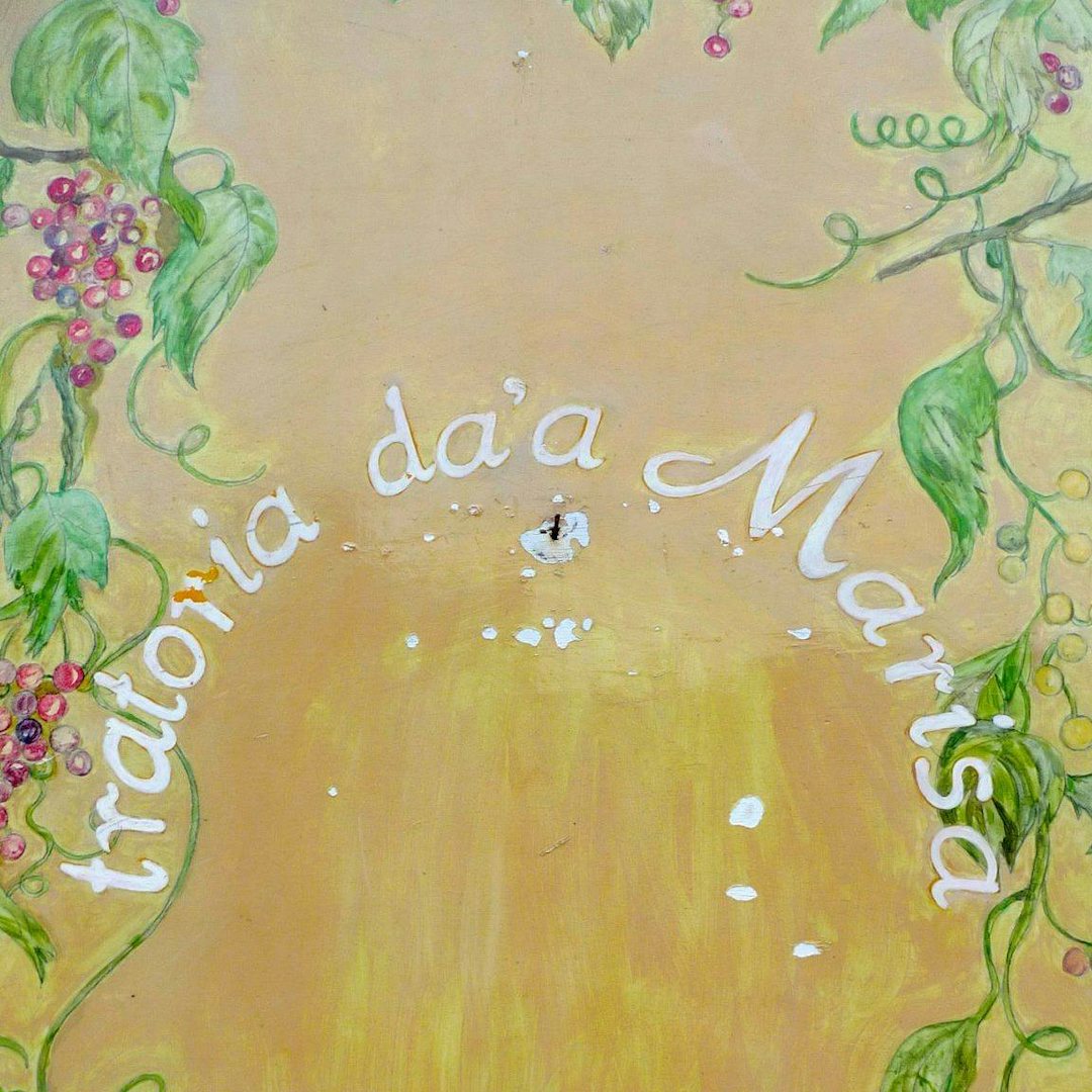 handpainted sign of Trattoria dalla Marisa