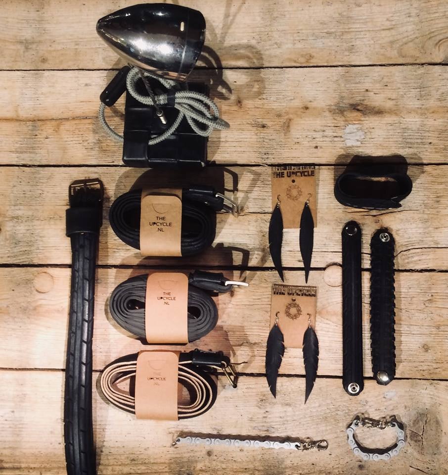 Flatlay of accessories made from recycled bicycle parts from the Upcycle Store
