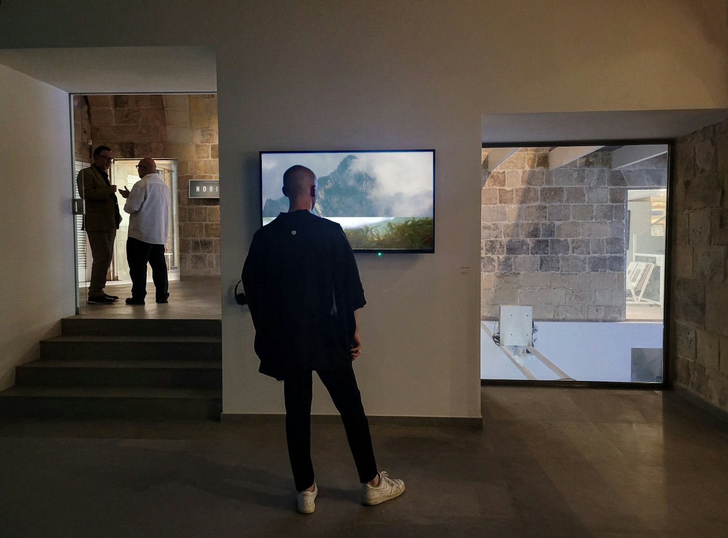 a man enjoying art at the Valletta Contemporary