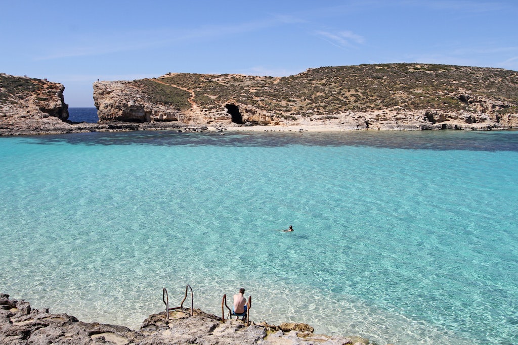 azure and crystal clear waters at comino