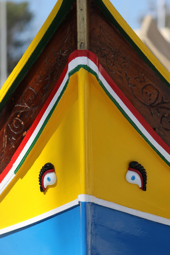 Painted eyes on a colourful luzzy in Marsaxlokk Malta