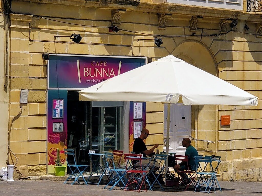 two men enjoying coffee at the terrace of Bunna Caffè