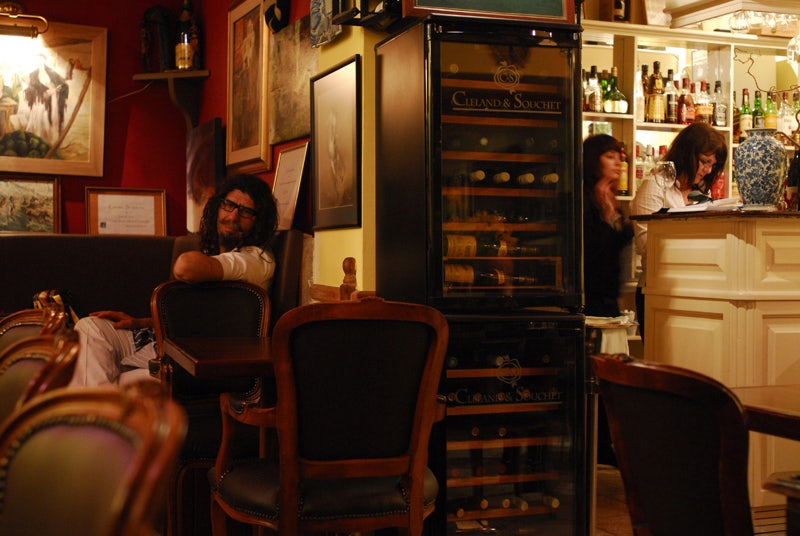 cozy and dark-lighthed interior of Ambrosia restaurant in Valletta