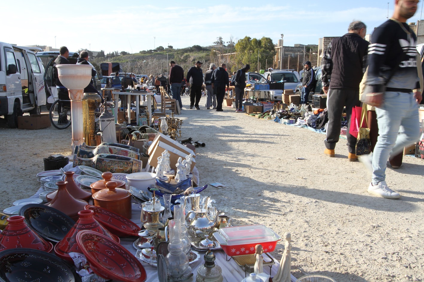 people strolling around at the Birgu car boot sale